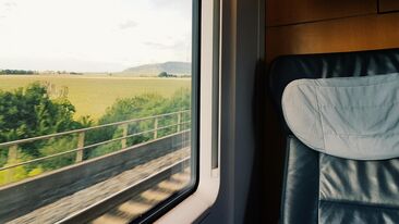 Looking out of a train window with Aura Heat Protect
